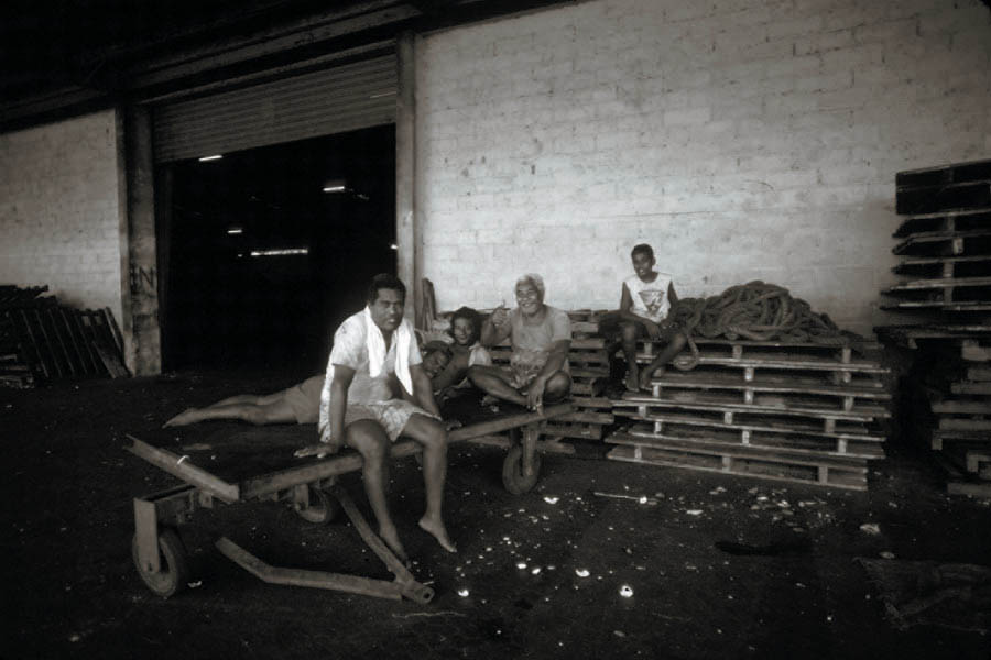 Resting factory workers, Solomon Islands